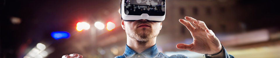 Man using VR Headset with hand reaching out